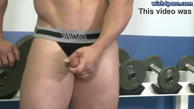 Muscle gay touching his firm ass